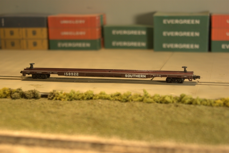 ConCor 90 foot trailer on flatcar.