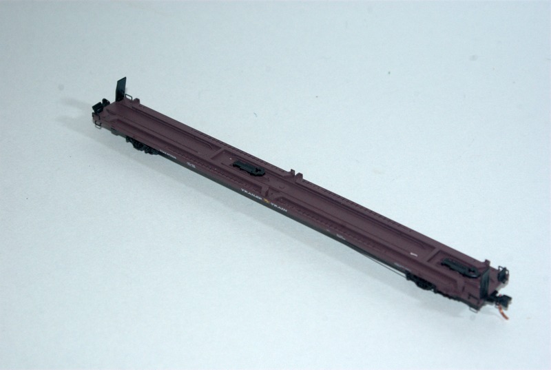 MTL 89'4" flatcar configured for 2 40 foot containers in Trailer-Train (brown) paint.