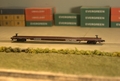 ConCor 90 foot trailer on flatcar.